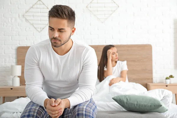 Sad couple after quarrel in bedroom — Stock Photo, Image