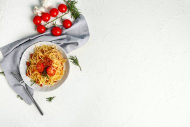 Plate with tasty pasta bolognese on white background