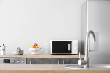 Interior of kitchen with modern microwave oven