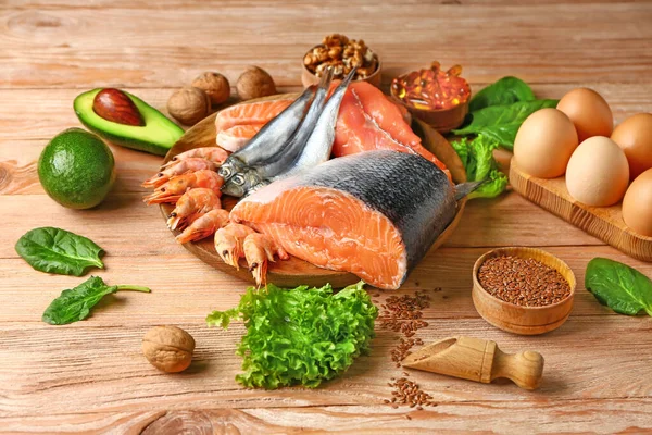 Produk-produk sehat kaya omega-3 dengan latar belakang kayu — Stok Foto