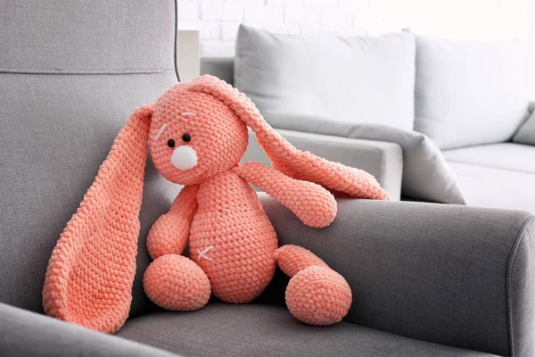 Cute baby toy on armchair — Stock Photo, Image