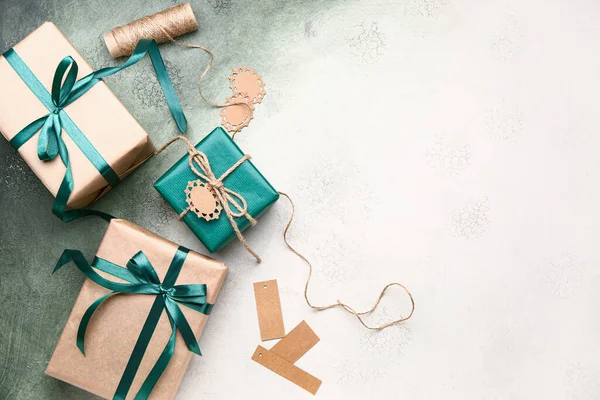 Packed gifts on color background — Stock Photo, Image