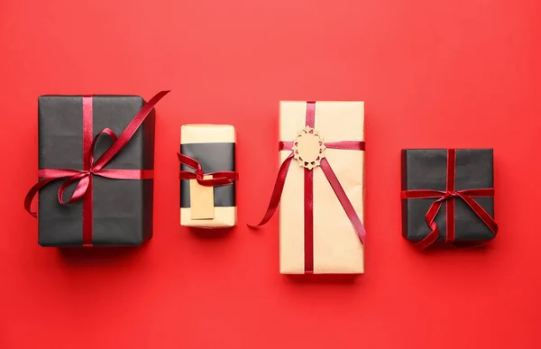 Packed gifts on color background — Stock Photo, Image