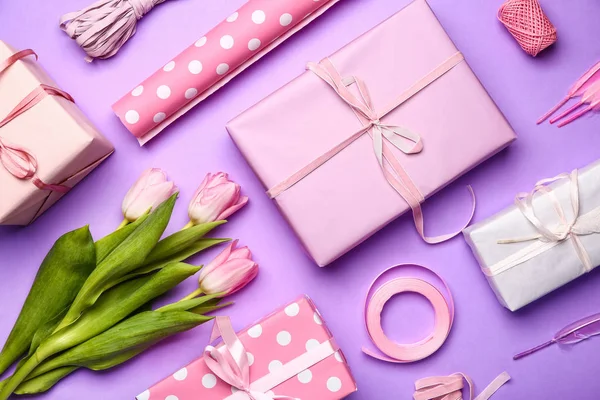 Composition with gifts on color background — Stock Photo, Image