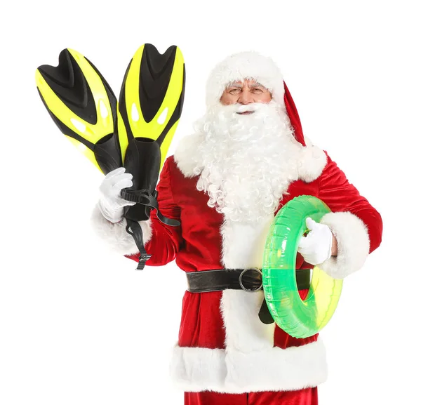 Weihnachtsmann mit Paddeln und Schwimmring auf weißem Hintergrund. Urlaubskonzept — Stockfoto