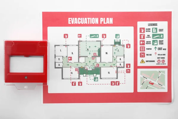 Plan de evacuación y punto de llamada manual sobre fondo blanco — Foto de Stock