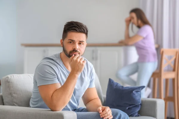 Upset young couple after quarrel at home — Stock Photo, Image