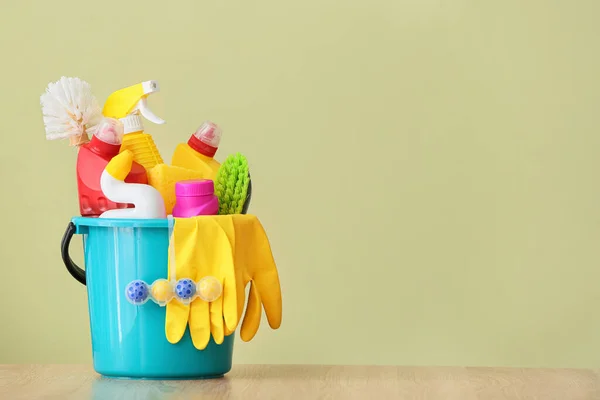 Set of cleaning supplies on color background — Stock Photo, Image