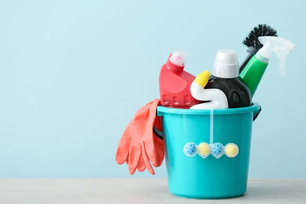 Set of cleaning supplies on color background — Stock Photo, Image