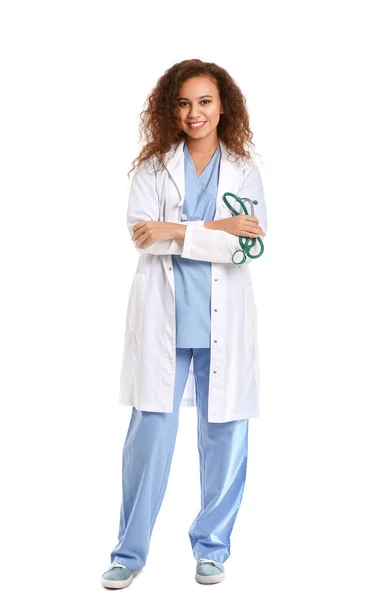 Young African-American doctor on white background — 스톡 사진