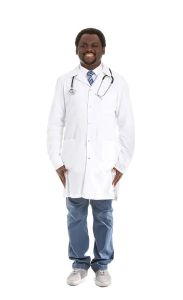 Male African-American doctor on white background — Stock Photo, Image