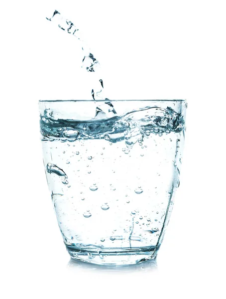 Glass of fresh water with splash on white background — Stock Photo, Image