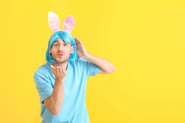 Man in funny disguise on color background. April fools' day celebration — ストック写真