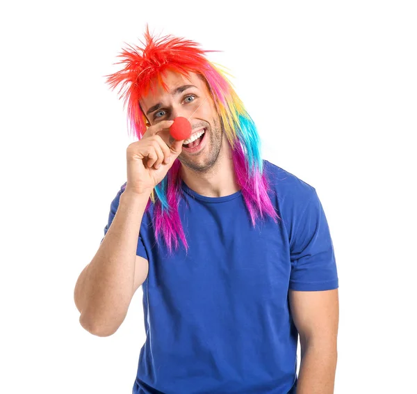 Man in funny disguise on white background. April fools' day celebration — Stock Photo, Image