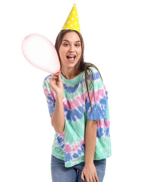 Woman in party hat and with balloon on white background. April fools' day celebration — Stock Photo, Image