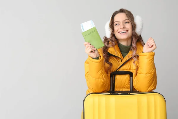 Beautiful female tourist on light background — Stock Photo, Image