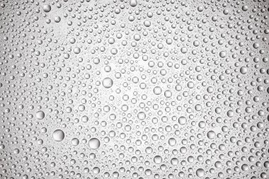 Işık arkaplanındaki su damlaları