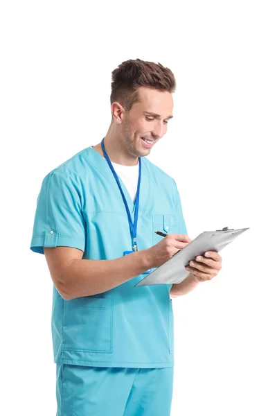 Porträtt av manlig receptionist i medicinsk uniform på vit bakgrund — Stockfoto