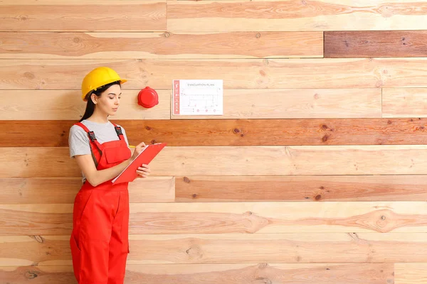 Fire safety specialist inspecting building