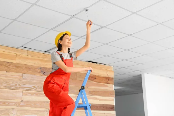 Fire safety specialist inspecting building