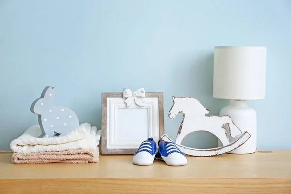 Baby accessories on table in room — Stock Photo, Image