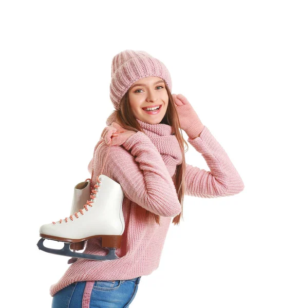 Beautiful young woman with ice skates on white background — Stock Photo, Image