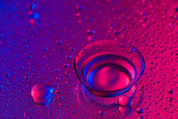 Contact lens on color background — Stock Photo, Image