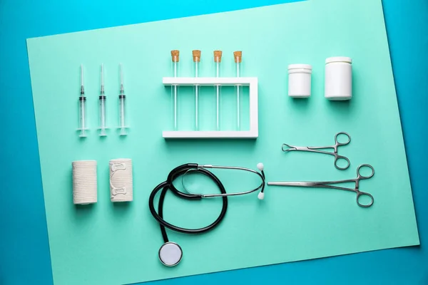 Set of medical supplies on color background — Stock Photo, Image