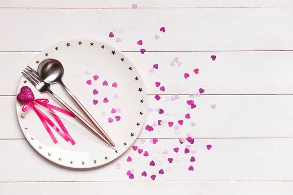 Beautiful table setting for Valentine's Day on white wooden background — Stock Photo, Image