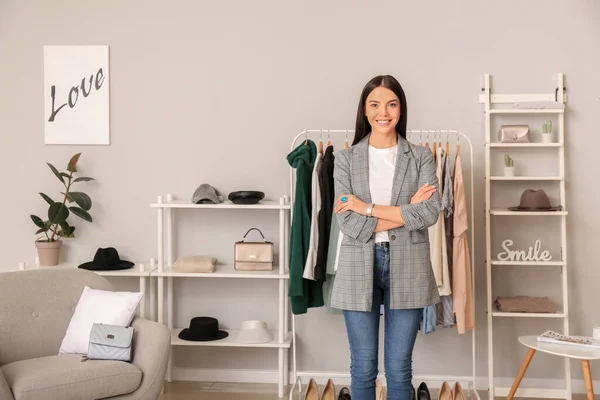 Young female clothes stylist at workplace — Stock Photo, Image