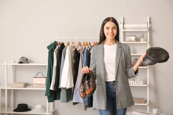 Young female clothes stylist at workplace — Stock Photo, Image