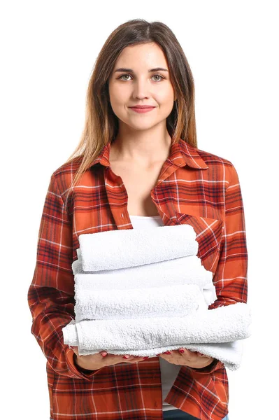 Beautiful young woman with laundry on white background — 图库照片