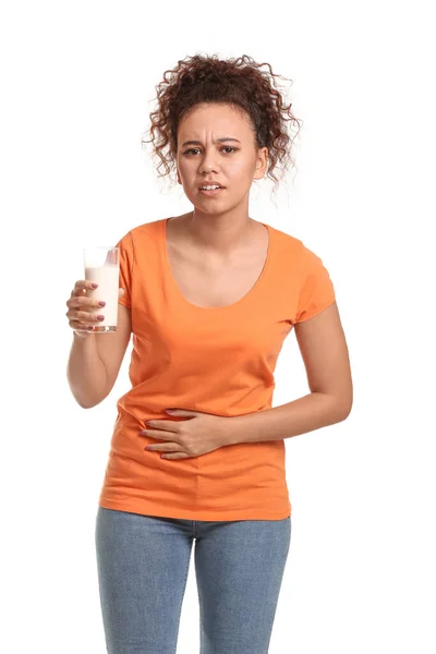 African-American woman with dairy allergy on white background — 스톡 사진