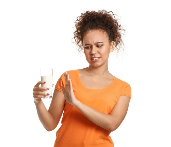 African-American woman with dairy allergy on white background — Stock Photo, Image