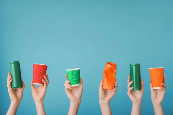 Hands with garbage on color background. Concept of recycling — Stock Photo, Image