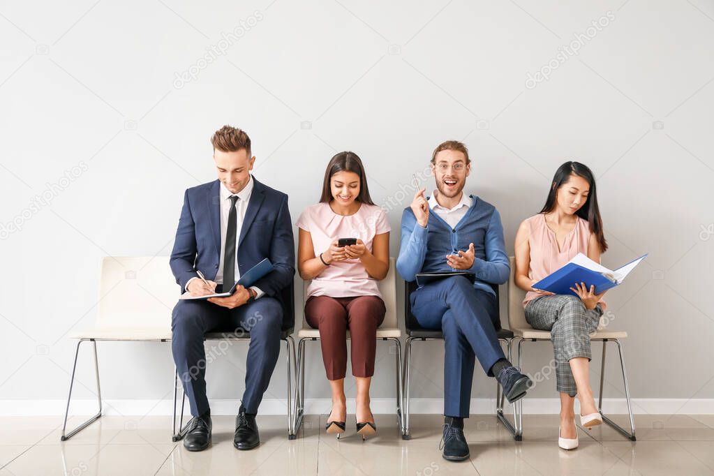 Young people waiting for job interview indoors