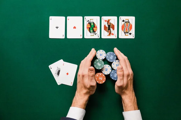 Man playing poker in casino, top view — ストック写真