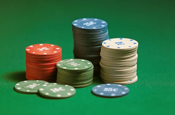 Chips for gambling games on table in casino — Stock Photo, Image