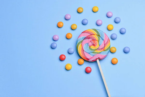 Tasty candies on color background — Stock Photo, Image