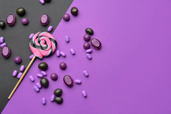 Lezzetli şeker renkli arka plan üzerinde ürün yelpazesine — Stok fotoğraf