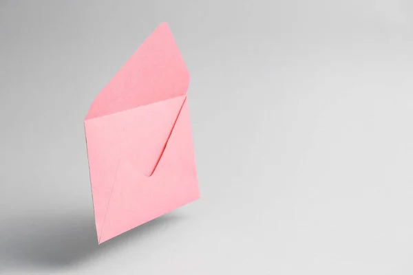 Paper envelope on grey background — 스톡 사진