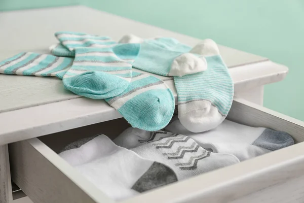 Cotton socks in table drawer, closeup