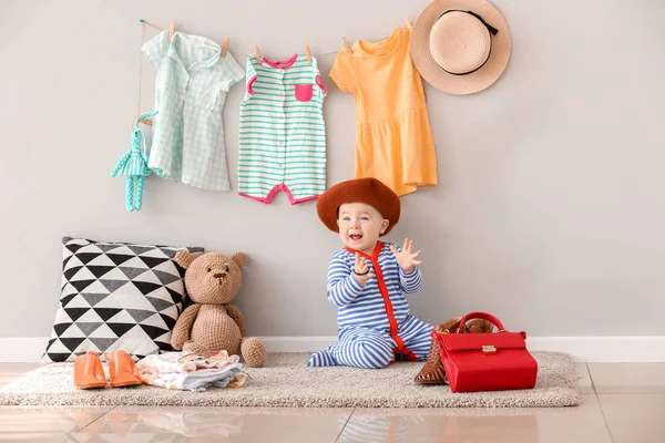 Cute baby with stylish clothes and accessories at home — Stock Photo, Image