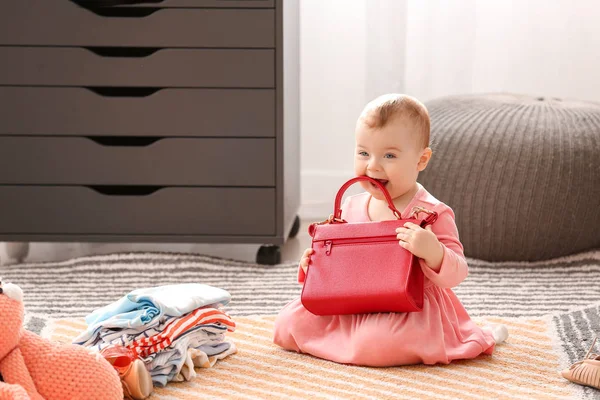 Cute baby girl with stylish clothes and accessories at home — Stock Photo, Image