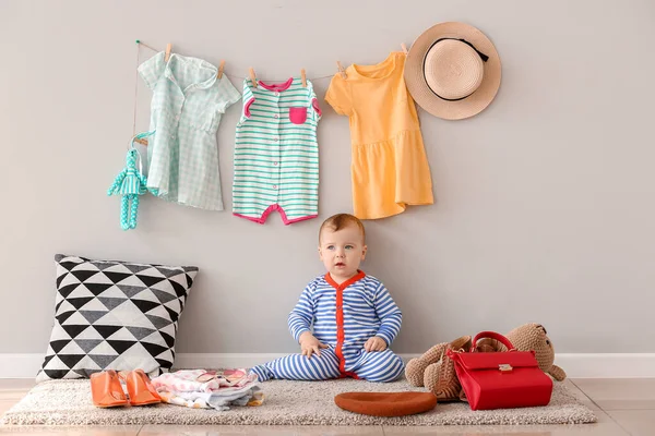 Cute baby with stylish clothes and accessories at home — Stock Photo, Image