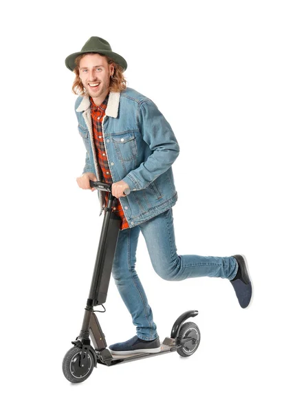 Young man with kick scooter on white background — Stock Photo, Image