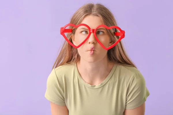 Woman in funny disguise on color background. April fools' day celebration — ストック写真