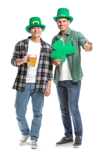 Young men with beer and clover on white background. St. Patrick's Day celebration — 스톡 사진