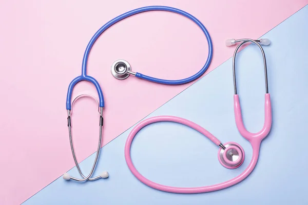 Stethoscopes on color background. Cardiology concept — Stock Photo, Image