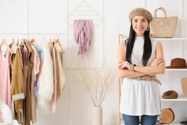 Young female clothes stylist at workplace — Stock Photo, Image